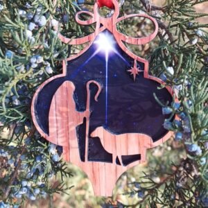 Shepherd and Sheep Christmas ornament featuring a layered MDF design with rustic wood-look cutouts, a shepherd and sheep, and a starry night background.